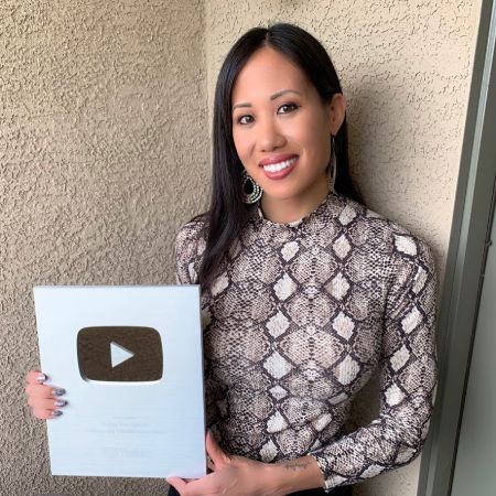 Helen Yee with her Silver Play button from YouTube.